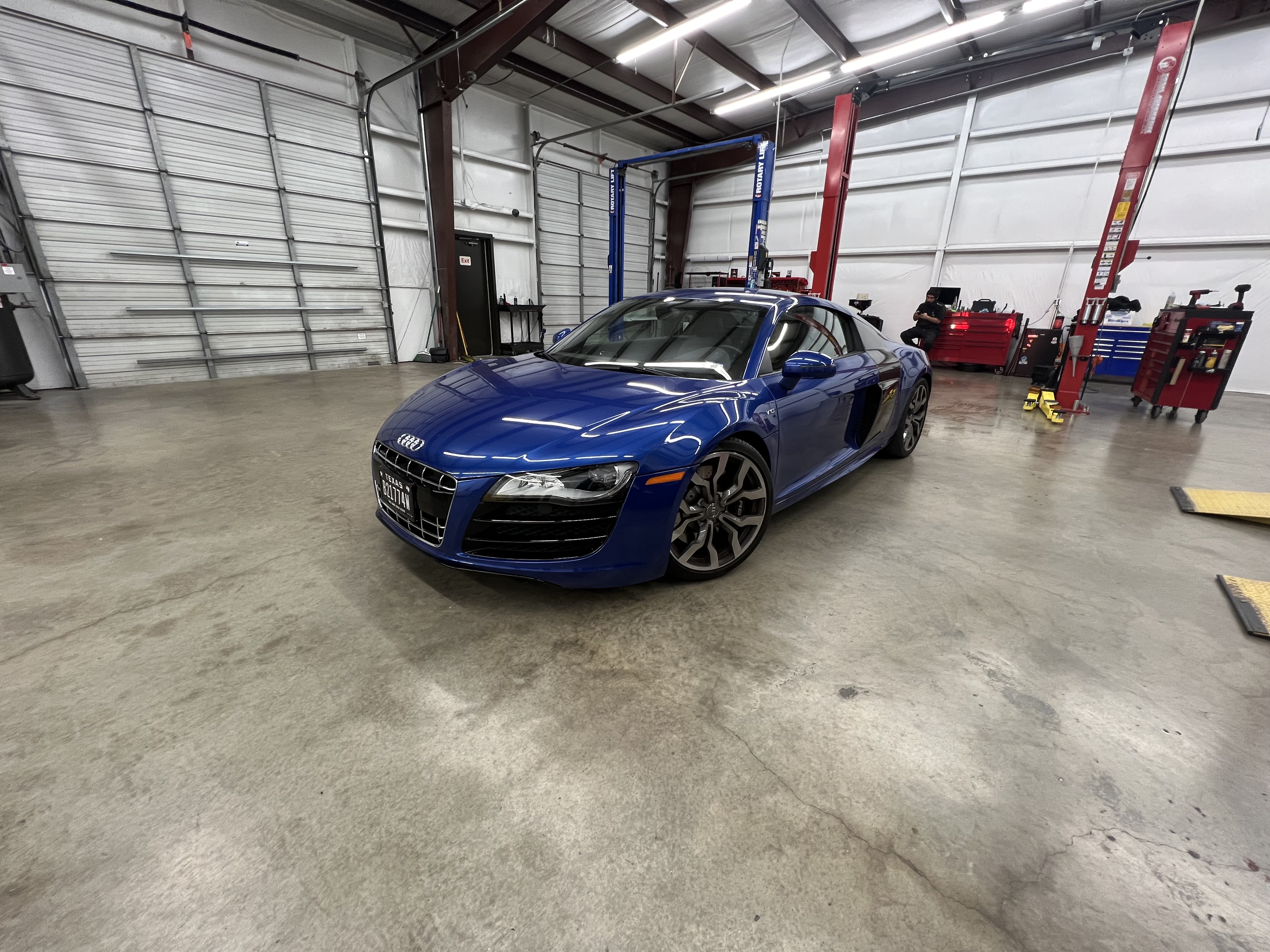 German car on the lift in the shop bay
